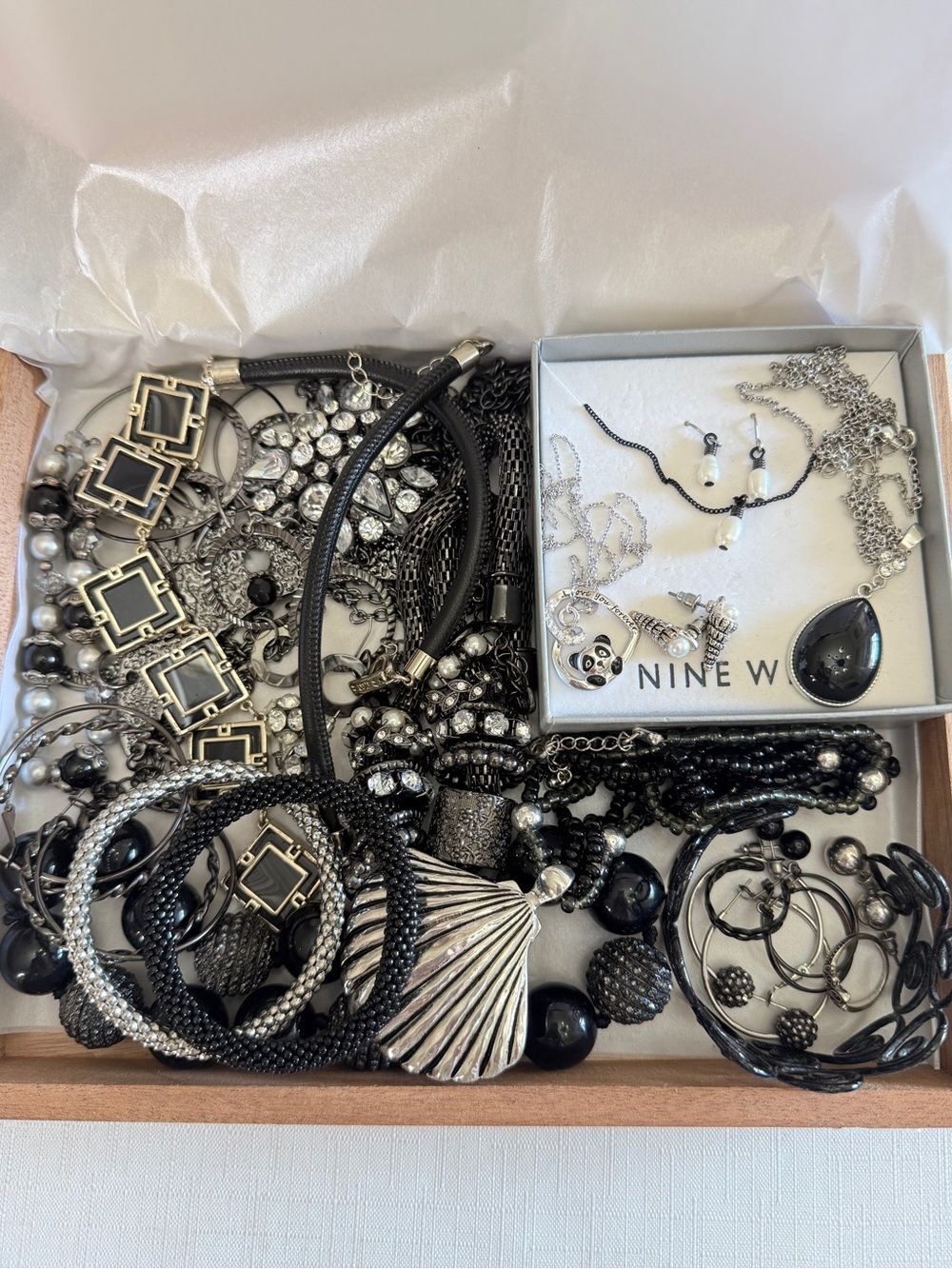 Black and Silver Box of Jewelry